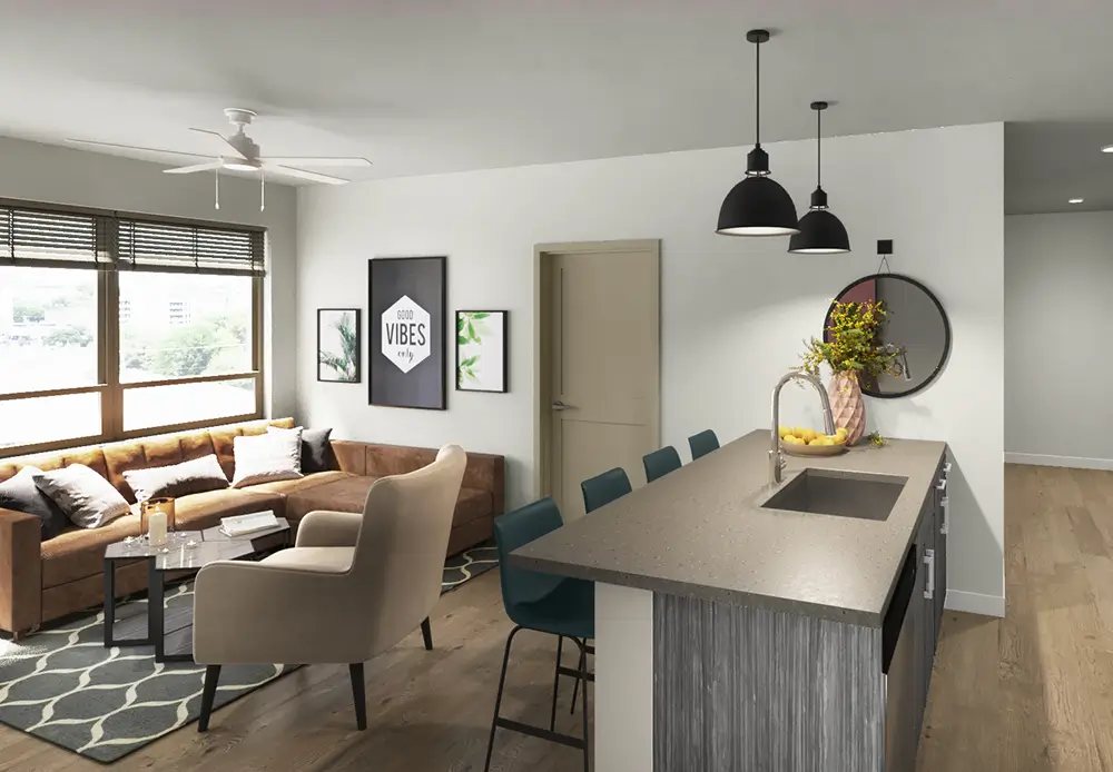 Sunlit living room with full kitchen